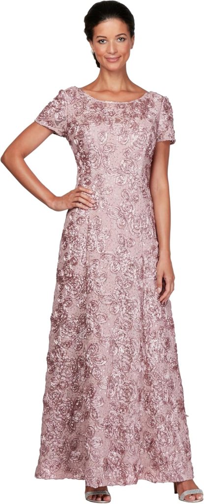Woman wearing rose gold floral sequin gown with short sleeves, perfect for mothers of the bride or groom.